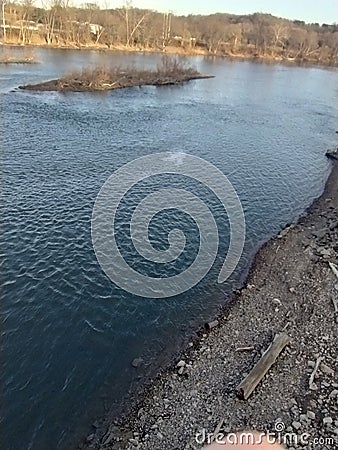 Small Dead Island Holding On To The Last Bit Of Life Before Swallowed Stock Photo