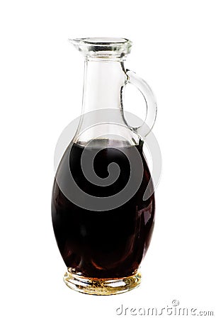 Small decanter with balsamic vinegar isolated on the white background Stock Photo