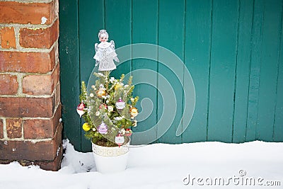 Small decorated christmas tree abandoned Stock Photo