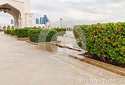 Small decorative fountain in the ornamental garden adjoining to the presidential palace - Qasr Al Watan in Abu Dhabi city, United Editorial Stock Photo