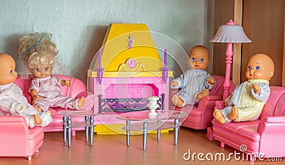 Small doll living room with kewpie dolls Stock Photo