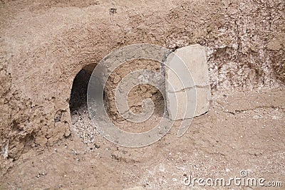 Small door in rock at mesa verde national park Stock Photo