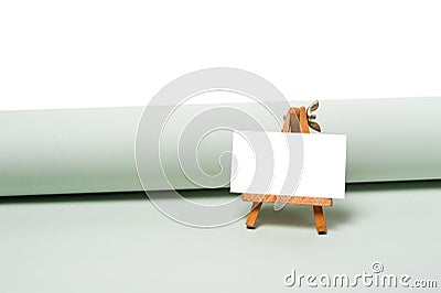 Small easel for mockup. advertising for art or office supplies. stand with an empty sheet of paper Stock Photo