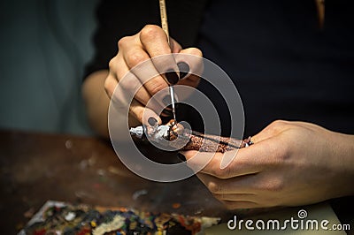 A small factory producing small batches pewter figurines. Editorial Stock Photo