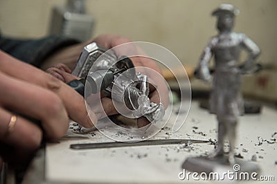 A small factory producing small batches pewter figurines. Editorial Stock Photo