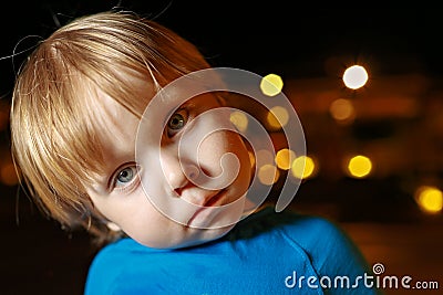 Small fair hair toddler boy in airplane Stock Photo