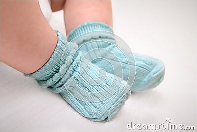 Small feet in socks Stock Photo