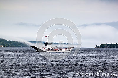 Small ferry on the river. Stock Photo