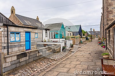 Small fishermen's houses by the sea in the neighborhood of Footdee in Aberdeen, Scotland. Stock Photo