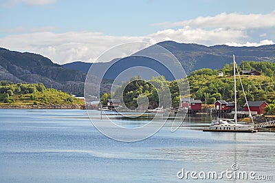 Small fishermen village with traditional red houses in Helgeland archipelago Stock Photo