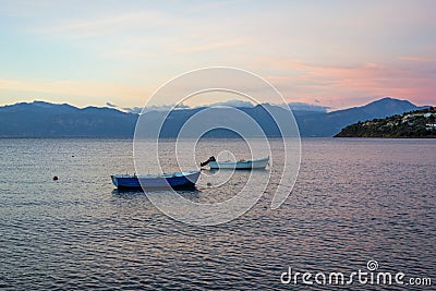 Small Fishing Boats at Dawn, Greece Stock Photo