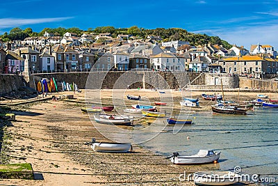 Small fishing boats in Mousehole harbour Editorial Stock Photo