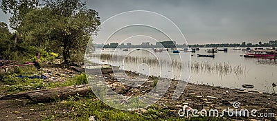 Small fishing boats with swans and ducks, HDR effect Stock Photo