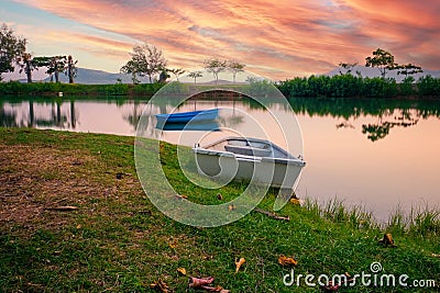 A small fishing boats wait on the shore Stock Photo