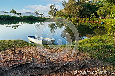 A small fishing boats wait on the shore Stock Photo