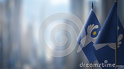 Small flags of the CIS on an abstract blurry background Editorial Stock Photo