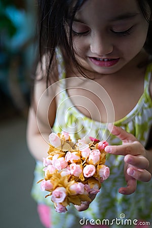 Small flower bouquet being hold by a toddler Stock Photo