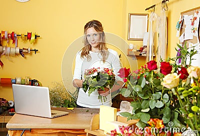 Small flower shop owner Stock Photo