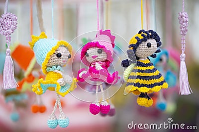 Small funny handmade knitted dolls Stock Photo