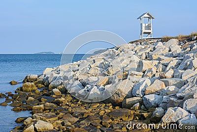 Small gazebo located on the rocks by the sea Stock Photo