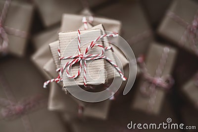 Small gift box on top of a pile of gift boxes. Stock Photo