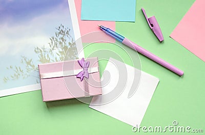 A small gift of pale lilac. Office, stickers on a green background Stock Photo