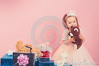 Small girl child with present box. big sale in shopping mall. Christmas gift. Thanks for your purchase. Happy birthday Stock Photo