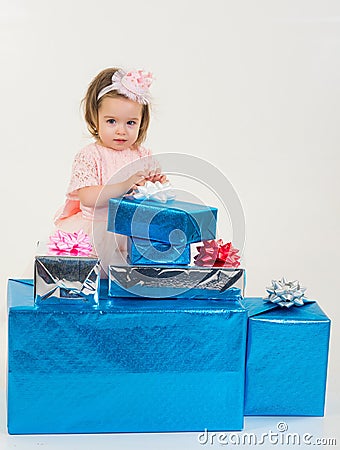 Small girl child with present box. Christmas gift. Thanks for your purchase. Happy birthday. New year party. happy Stock Photo