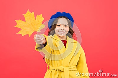 Small girl fall outfit red background. Hello october. Climate changes. Little girl welcome autumn. Kid girl cute face Stock Photo
