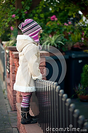Small girl in a garden Stock Photo