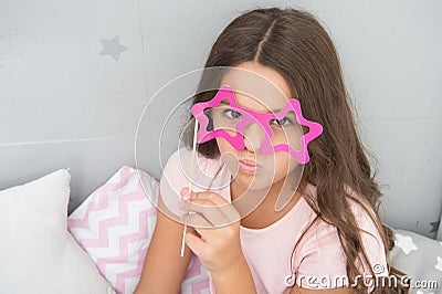 Small girl party glasses. pajama party. ready for fun. funny look of small kid. childhood moments. international Stock Photo