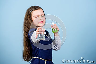 Small girl scientist with testing flask. back to school. science research in lab. Small genius girl. education and Stock Photo