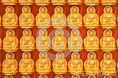 Small golden Buddha background Stock Photo