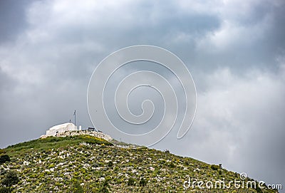 Small greek orthodox chapel on top of the hill. Greek islands Stock Photo