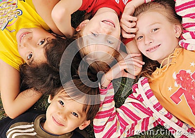 Small group of happy children outdoor Stock Photo