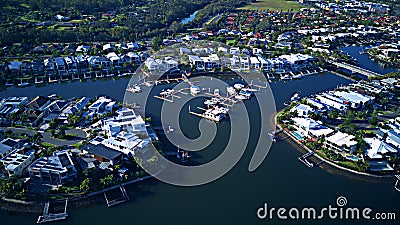 Small Harbour View Canal Estate and Boat Harbour RiverLinks Estate next to Coomera River Morning view Hope Island, Gold Coast Stock Photo