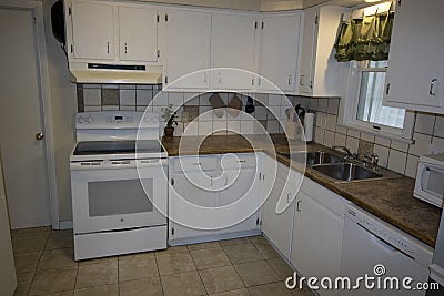 Small home renovated kitchen staged and ready for sale Stock Photo