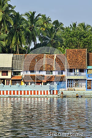 Small houses of South Indian traditional architectural near tank at Suchindram Editorial Stock Photo