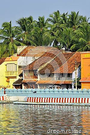 Small houses of South Indian traditional architectural near water tank at Suchindram Editorial Stock Photo
