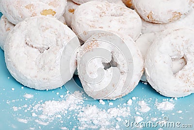 Small icing sugar covered donuts Stock Photo