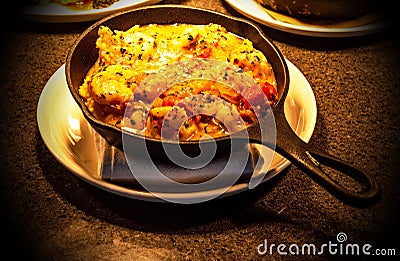 Is not your mouth just starting to salivate for this iron skillet dish well presented Stock Photo