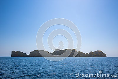 Small island in a blue endless sea with copy space, summer travel vacation, Phi Phi island, Krabi, Thailand Stock Photo