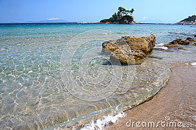 Small island with church Agios Nikolaos near Ellinika beach, Euboea- Greece Stock Photo