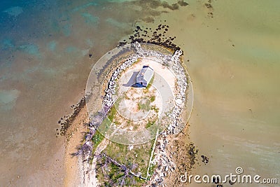 Small island church in lagoon near Posedarje aerial view Stock Photo