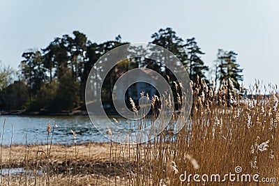 Small island with a house in Finland Stock Photo