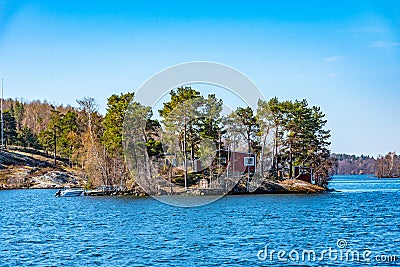 Small island with a shed on Lake Malaren near Stockholm, Sweden Stock Photo