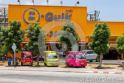 small Japanese trucks converted into taxis for tourists called tuk tuk in Thailand on the island of Phuket. Multi-colored cars on Editorial Stock Photo