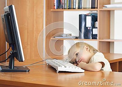 Small kid with computer Stock Photo