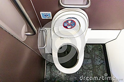 Lavatory toilet washroom in commercial flight aircraft Stock Photo