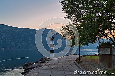 Embankment overlooking the mountains at sunset Stock Photo